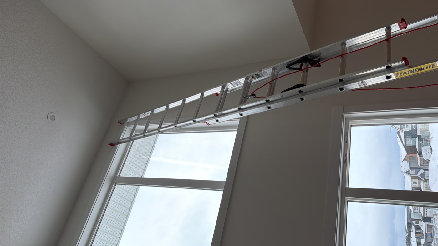 Tall window before custom drapery installation